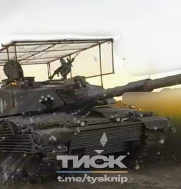 Challenger 2 with cage and slat armor